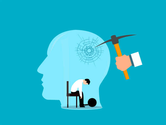 Illustration of a transparent head with a cracked glass effect, struck by a hammer, with a small, despondent figure seated inside, symbolising psychological distress
